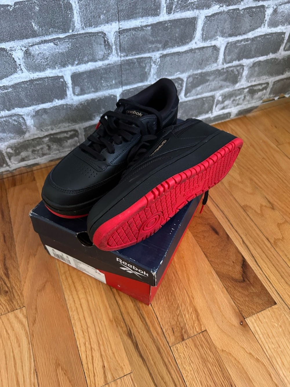 Reebok Men's Black Sneakers with Red Outsole